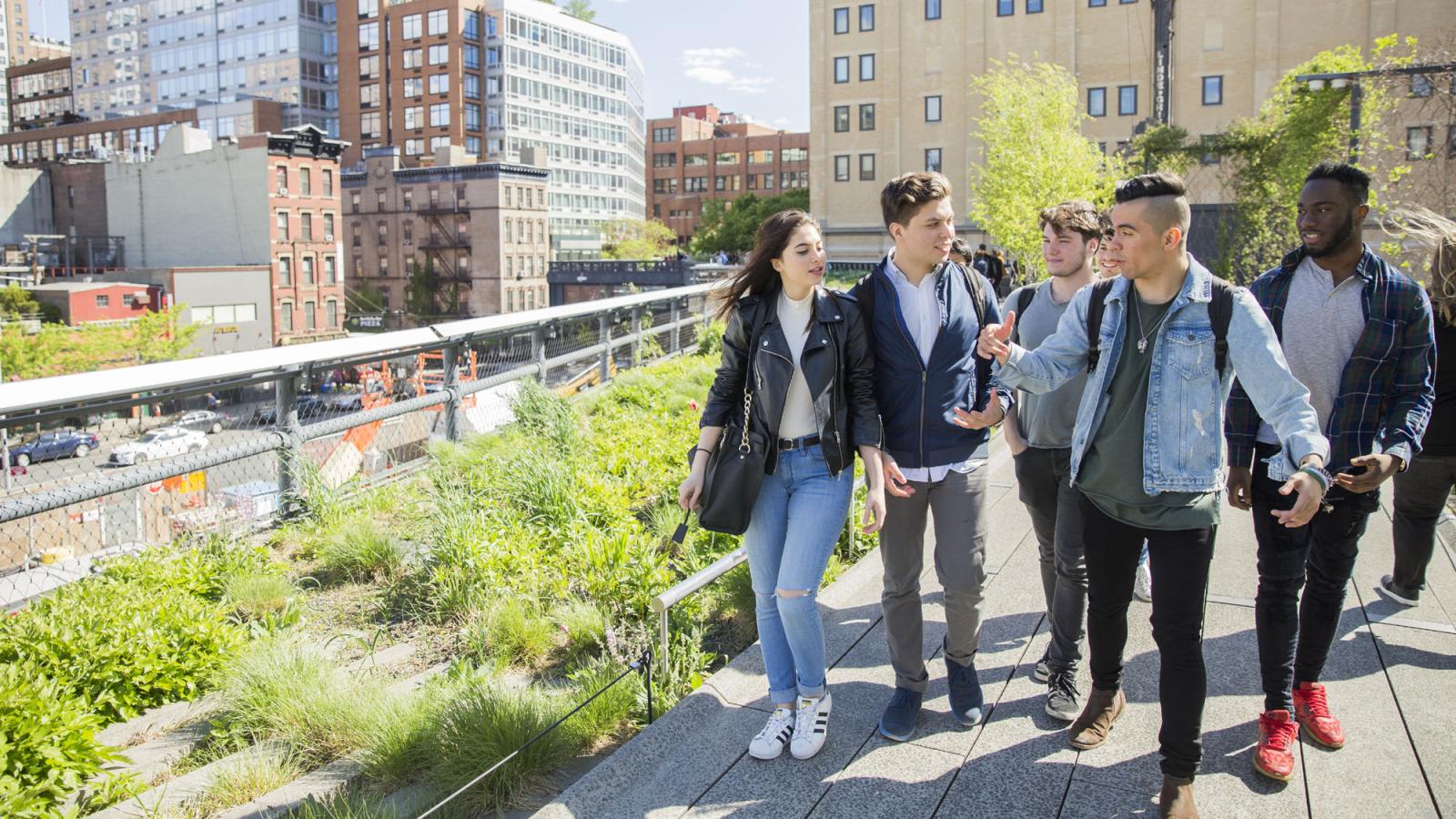 four  students walking on the High Line in Manhattan